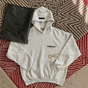 New Essentials Gray Hoodie with tags and dust bag